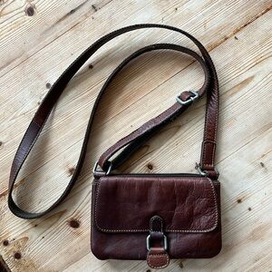 Gently used crossbody by Jack George. Rich brown